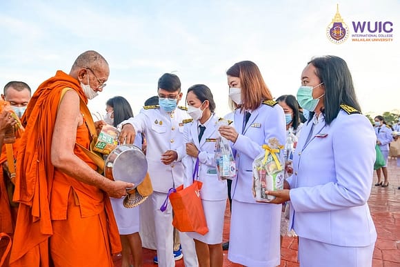On 29th March 2022, at 06.30 hrs, Prof. Dr. Sombat Thamrongthanyawong, Acting President of Walailak University, presided over the dry food merit-making ceremony to the monks, attended the ceremony of islam and prayed for the blessings of christianity for the glory and prosperity on the occasion of the 30th anniversary of the establishment of Walailak University. Mr. Trairat Chairat, Deputy Governor of Nakhon Si Thammaratat together with distinguished guests in Nakhon Si Thammarat Province, executive team, employees and students of Walailak University attended the ceremony at WBP Walailak Botanic Park.